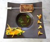 Bar de Ligne rôti, bouillon au thé Pu'Erh 5 ans d'âge, potimarron, quelques girolles
